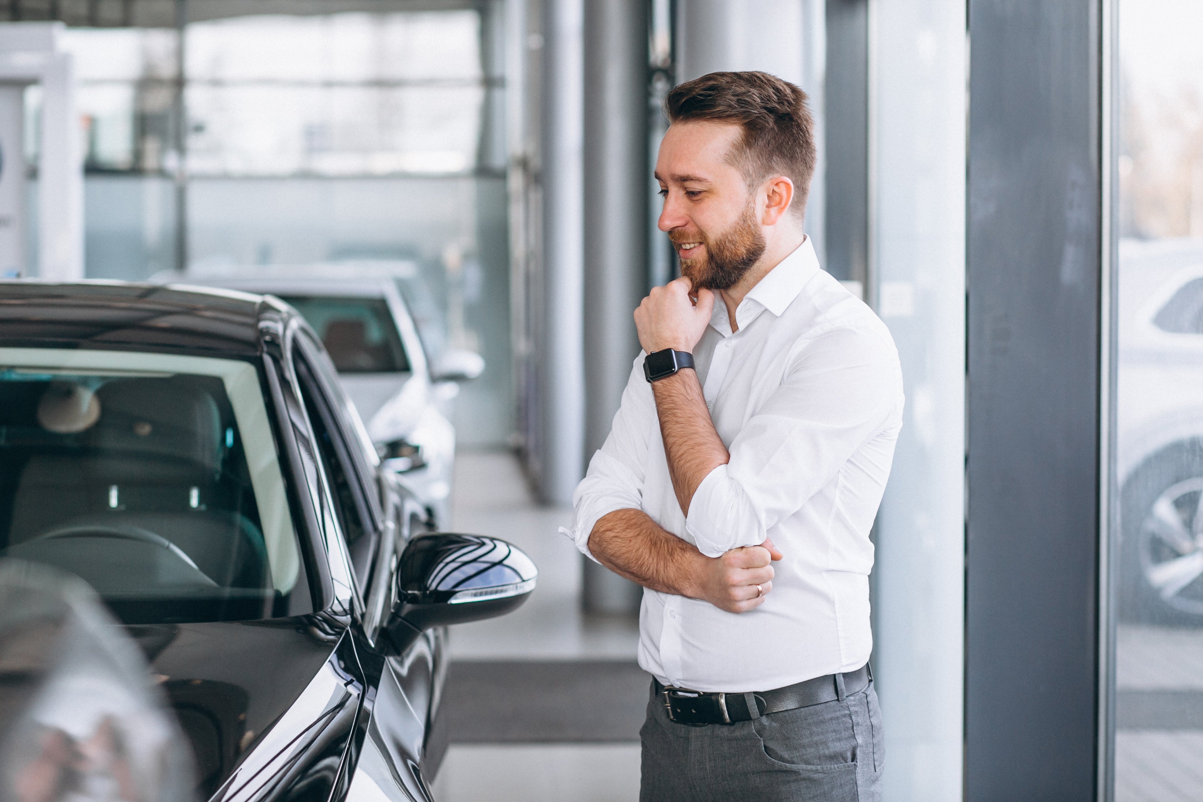 business-man-buying-car-showroom